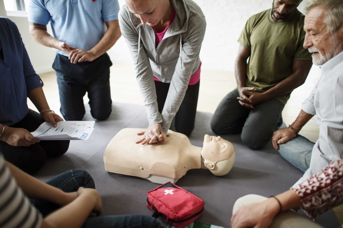 Group of diverse people in cpr training class